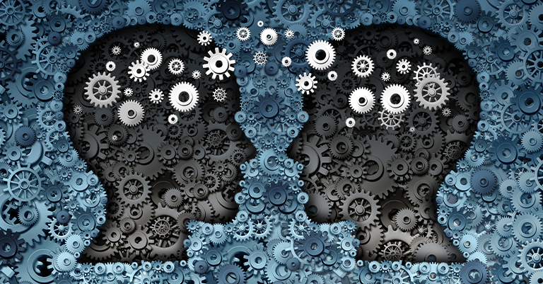 TransferLearn_4 • Andrew Roche AI Two human head silhouettes made of interlocking gears, symbolizing knowledge sharing and intellectual collaboration.